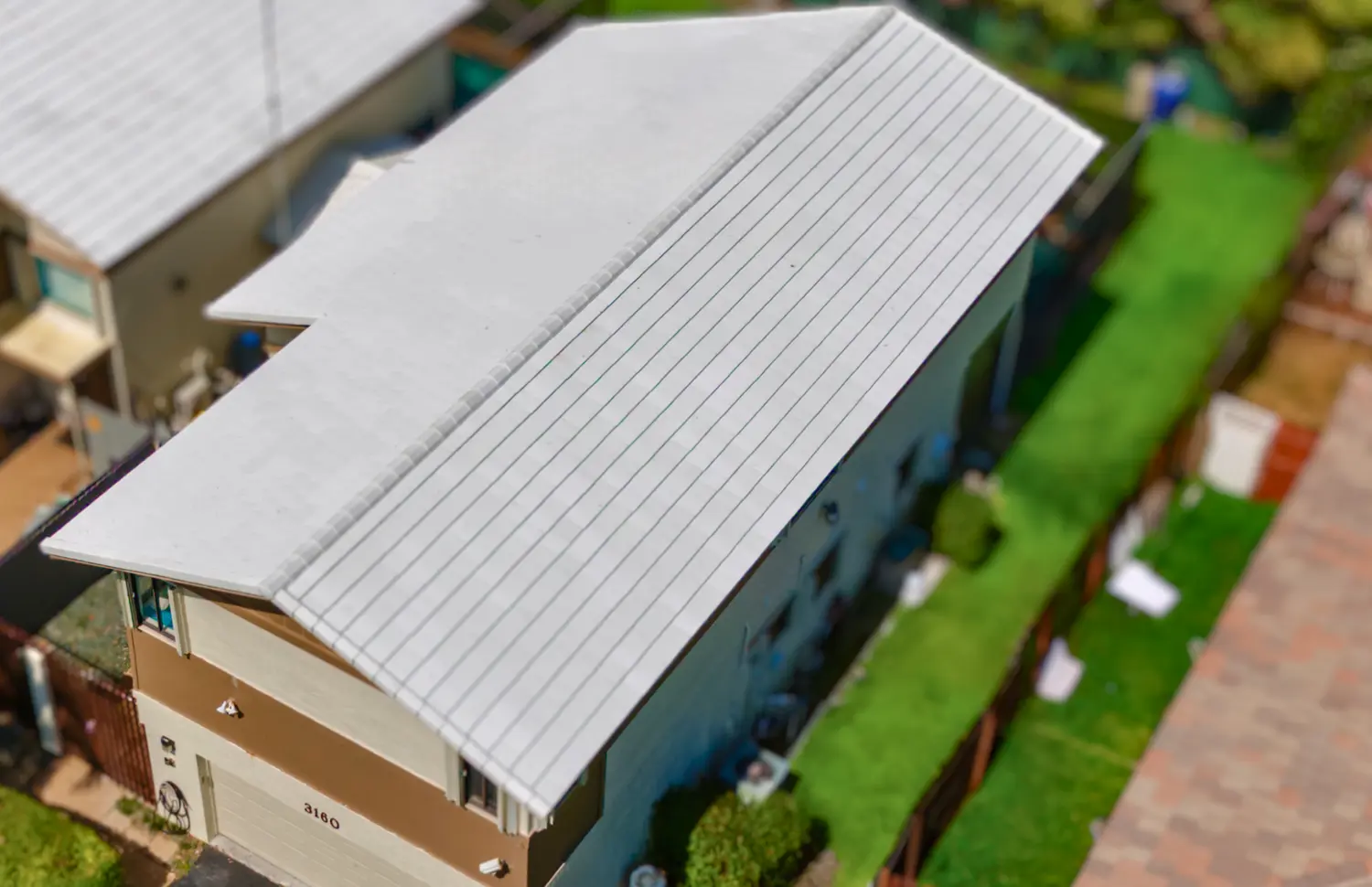 Distinctive Roofing - Miniature of Westlake house with white color roof